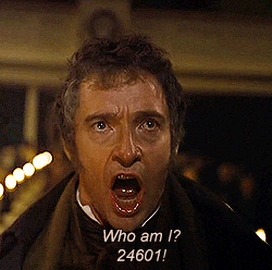 Hugh Jackman as Jean Valjean in Les Miserables, singing "Who am I? 24601!"
